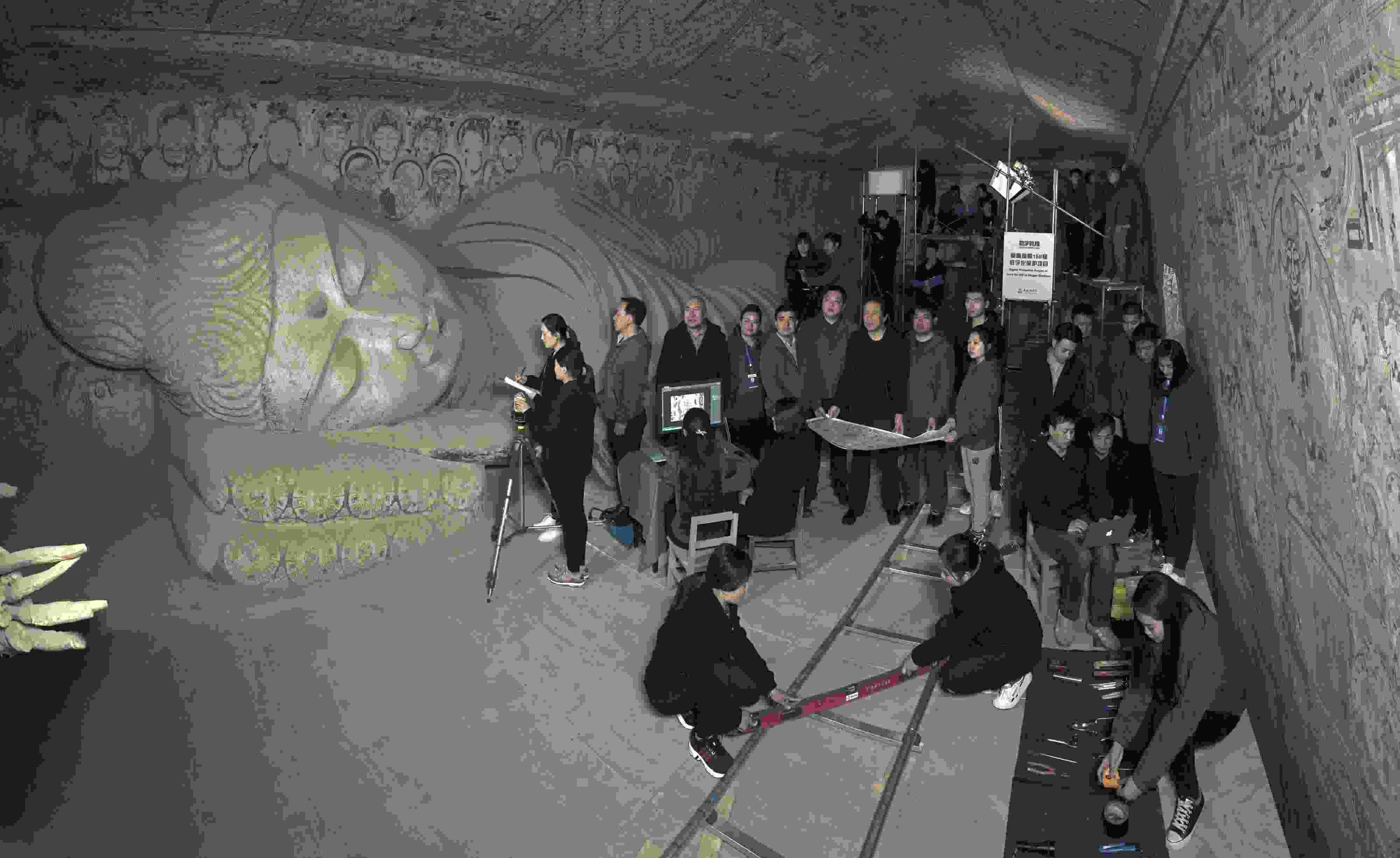 敦煌研究院文物數(shù)字化團隊在莫高窟第158窟工作現(xiàn)場。敦煌研究院供圖