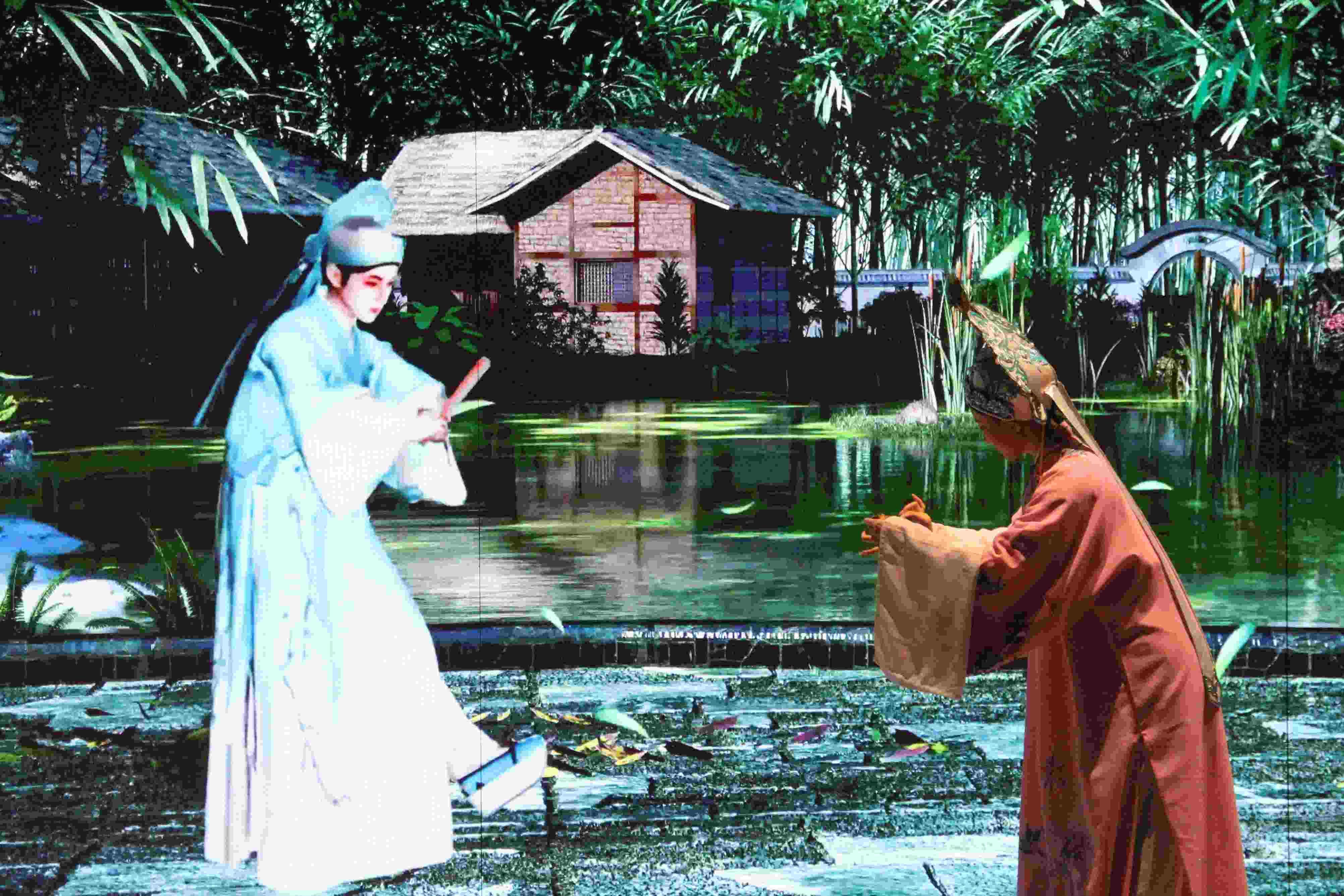 真人演員與虛擬人演員在“元啟金陵”南京數(shù)字文化客廳出演《梁山伯與祝英臺(tái)》經(jīng)典選段。受訪者供圖